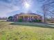 Well-maintained single-Gathering home featuring a brick facade, front porch, and green lawn at 2615 High Ridge Church Rd, Marshville, NC 28103