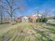Brick home with gabled roof, manicured bushes, and sunny lawn at 2615 High Ridge Church Rd, Marshville, NC 28103