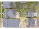 Aerial view showing the property's layout, backyard patio, landscaping, and surrounding neighborhood at 304 W Park Ave, Charlotte, NC 28203