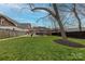 Spacious backyard featuring a patio area with outdoor seating and a fire pit at 304 W Park Ave, Charlotte, NC 28203