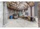 Unfinished basement with brick supports and table awaiting personalization at 304 W Park Ave, Charlotte, NC 28203