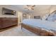 Warm and inviting bedroom featuring a dresser, mounted TV, and hardwood floors at 304 W Park Ave, Charlotte, NC 28203