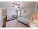 bedroom featuring a twin bed, area rug, ceiling fan, with lots of light at 304 W Park Ave, Charlotte, NC 28203