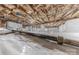 Clean crawl space with white plastic sheeting on ground and insulation above at 304 W Park Ave, Charlotte, NC 28203