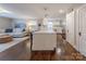 Modern kitchen features a center island, white cabinets, and stainless steel appliances at 304 W Park Ave, Charlotte, NC 28203