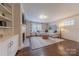 Comfortable living room features a fireplace, built-in shelves, and ample seating at 304 W Park Ave, Charlotte, NC 28203