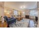 Inviting living room featuring hardwood floors, a fireplace, and a comfortable sitting area at 304 W Park Ave, Charlotte, NC 28203