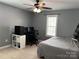 Bedroom features space for a desk and bed with a window for natural light at 321 Creek Se Trl, Concord, NC 28025