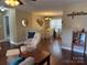 Comfortable living room and dining area enhanced by hardwood floors and stylish decor at 321 Creek Se Trl, Concord, NC 28025