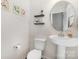 Neat half bathroom featuring a pedestal sink, modern fixtures, and stylish decor on the walls at 3230 Yarmouth Ln, Gastonia, NC 28056