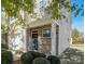 Charming two-story townhome with a brick facade, well-manicured landscaping, and an attached one-car garage at 3230 Yarmouth Ln, Gastonia, NC 28056