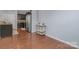 Open floor plan seamlessly connects the kitchen with stainless appliances to the hardwood-floored dining area at 3230 Yarmouth Ln, Gastonia, NC 28056