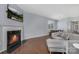 Spacious living room has hardwood floors and features a fireplace, creating a cozy and inviting atmosphere at 3230 Yarmouth Ln, Gastonia, NC 28056