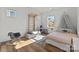 Playful bedroom with a climbing gym, canopy bed, and a chair in a sun-filled room at 343 Belton St, Charlotte, NC 28209