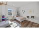 Bright bedroom with a canopy bed, climbing gym, and large windows at 343 Belton St, Charlotte, NC 28209