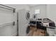 This laundry room boasts a stacked washer/dryer and practical countertop space for folding and organization at 343 Belton St, Charlotte, NC 28209
