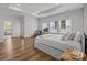 Bright main bedroom featuring hardwood floors, large windows, and a serene atmosphere at 343 Belton St, Charlotte, NC 28209