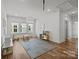 Spacious playroom with hardwood floors and large windows, perfect for ' activities and creative play at 343 Belton St, Charlotte, NC 28209