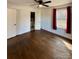 Bright bedroom with hardwood floors, closet, and ensuite bathroom, natural light with window at 3437 Wilkesboro Hwy, Statesville, NC 28625