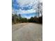 A spacious driveway with great potential for outdoor activities and parking at 3437 Wilkesboro Hwy, Statesville, NC 28625