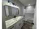 Bathroom featuring granite counters, decorative lighting and fixtures, and a tub with shower at 3537 Taxahaw Rd, Lancaster, SC 29720