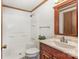 Cozy bathroom with white tiled shower and vanity at 3660 Fieldcrest Nw Cir, Concord, NC 28027