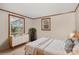 Bright bedroom featuring wood trim, fresh paint, and plenty of natural light at 3660 Fieldcrest Nw Cir, Concord, NC 28027