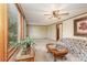 Cozy living room with large windows, natural light, and comfortable seating at 3660 Fieldcrest Nw Cir, Concord, NC 28027