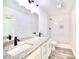 Bathroom featuring double granite vanity and tiled walk-in shower at 405 Aquadale Rd, Albemarle, NC 28001