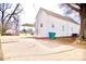 Driveway and backyard of a white brick home, displaying the expansive outdoor area at 405 Aquadale Rd, Albemarle, NC 28001