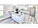 Bright kitchen features granite countertops, modern appliances, and an island at 405 Aquadale Rd, Albemarle, NC 28001