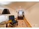 This bedroom features a long carpet, wooden bed, and recessed lighting at 423 Bethel Dr, Salisbury, NC 28144