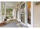 Inviting front porch with rocking chair and views at 423 Bethel Dr, Salisbury, NC 28144
