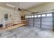 Spacious garage featuring an automatic door, ramp, and ample storage space at 423 Bethel Dr, Salisbury, NC 28144