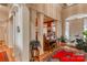 Elegant hallway featuring architectural columns, hardwood floors, and an open view to a bright room at 423 Bethel Dr, Salisbury, NC 28144