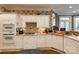 Well-equipped kitchen with gas cooktop, white cabinets, and modern appliances is perfect for culinary enthusiasts at 423 Bethel Dr, Salisbury, NC 28144