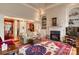 Inviting living room with a fireplace, built-in shelving, and a decorative rug at 423 Bethel Dr, Salisbury, NC 28144