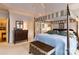 Serene bedroom with a canopy bed, ensuite bathroom access, and ample closet space offers a peaceful retreat at 423 Bethel Dr, Salisbury, NC 28144