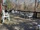 Expansive back deck featuring plenty of seating, ideal for gatherings and enjoying wooded views at 511 Glencurry Dr, Charlotte, NC 28214