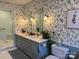 Charming bathroom with leaf-print wallpaper, double vanity, and glass shower at 511 Glencurry Dr, Charlotte, NC 28214