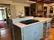 Large kitchen island with cooktop and adjacent butler's pantry visible at 511 Glencurry Dr, Charlotte, NC 28214