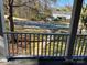 View from porch overlooking landscaped front yard and the street with an attractive house at 511 Glencurry Dr, Charlotte, NC 28214