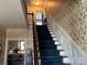 Carpeted staircase with decorative wallpaper leading to the upper level at 511 Glencurry Dr, Charlotte, NC 28214