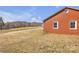 A charming brick home with a spacious yard backing to a mountain view at 6231 Nc 16 N Hwy, Taylorsville, NC 28681