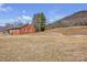 Traditional brick home on a large lot, partially bordered by a wooded hillside at 6231 Nc 16 N Hwy, Taylorsville, NC 28681