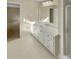 The bathroom has a single sink vanity with a white countertop and white cabinets at 6813 Linda Lake Dr, Charlotte, NC 28215
