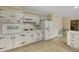Kitchen with white cabinets, countertops and stainless steel appliances at 6813 Linda Lake Dr, Charlotte, NC 28215