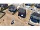 Aerial view of the backyard features a patio area with canopy next to a manicured lawn at 815 Oak Embers Se Dr, Concord, NC 28025