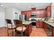 Gourmet kitchen with an island, stainless steel appliances, and plenty of counter space at 815 Oak Embers Se Dr, Concord, NC 28025