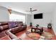 Comfortable living room with hardwood floors, a large window, and stylish decor, providing an inviting atmosphere at 815 Oak Embers Se Dr, Concord, NC 28025
